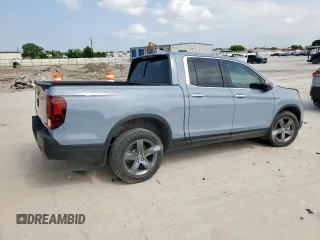 2023 Honda Ridgeline RTL-E with VIN 5FPYK3F76PB036572, listed as a Copart auction lot 54717085 with 34,516 mi miles and Salvage title. Bid and sale history available at DreamBid. Image 3.