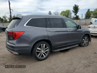 2017 Honda Pilot Touring with VIN 5FNYF5H97HB039702, listed as a Copart auction lot 54046145 with 149,050 mi miles and Salvage Title. Bid and sale history available at carsss.com. Image 3.