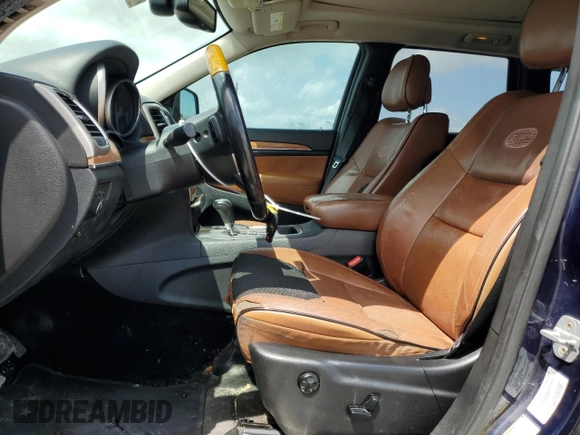 2013 Jeep Grand Cherokee Overland with VIN 1C4RJECT0DC533848, listed as a Copart auction lot 51319385 with 181,436 mi miles and Salvage Title. Bid and sale history available at carsss.com. Image 7.