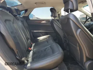 2013 Lincoln MKZ z VIN 3LN6L2GK6DR827247, wystawiony jako Copart lot #58029095 z przebiegiem 159 174 mil mil oraz Szkoda całkowita • Salvage title. Historia ofert i sprzedaży dostępna na DreamBid. Obrazek 10.