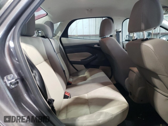 2012 Ford Focus SE z VIN 1FAHP3F28CL444261, wystawiony jako Copart lot #61174145 z przebiegiem 77 612 mil mil oraz Szkoda całkowita • Salvage title. Historia ofert i sprzedaży dostępna na DreamBid. Obrazek 10.