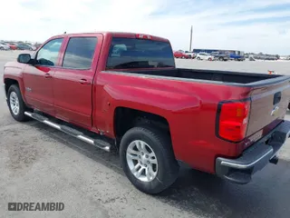 2018 Chevrolet Silverado 1500 LT with VIN 3GCPCREC9JG388257, listed as a IAAI auction lot 41824534 with 96,954 mi miles. Bid and sale history available at carsss.com. Image 3.