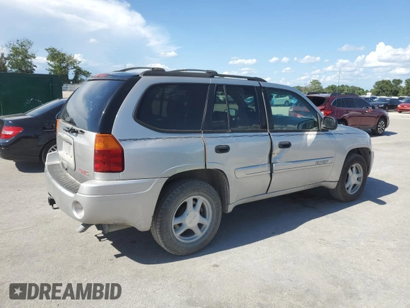 2004 GMC Envoy SLT с VIN 1GKDS13S542129977, выставлен на аукционе Copart как лот 61170465 с пробегом 129 897 миль миль и Списание • Salvage title. История ставок и продаж доступна на DreamBid. Изображение 3.
