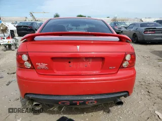 2004 Pontiac GTO z VIN 6G2VX12G04L206500, wystawiony jako Copart lot #55048785 z przebiegiem 102 254 mil mil oraz Szkody całkowita. Historia ofert i sprzedaży dostępna na DreamBid. Obrazek 6.