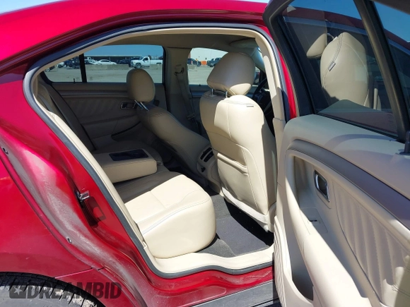 2013 Ford Taurus SEL with VIN 1FAHP2E8XDG231807, listed as a IAAI auction lot 41774166 with 120,639 mi miles and . Bid and sale history available at carsss.com. Image 8.