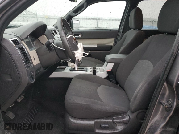 2009 Mercury Mariner with VIN 4M2CU81G39KJ17532, listed as a Copart auction lot 43907455 with 214,212 mi miles and Salvage title. Bid and sale history available at DreamBid. Image 7.