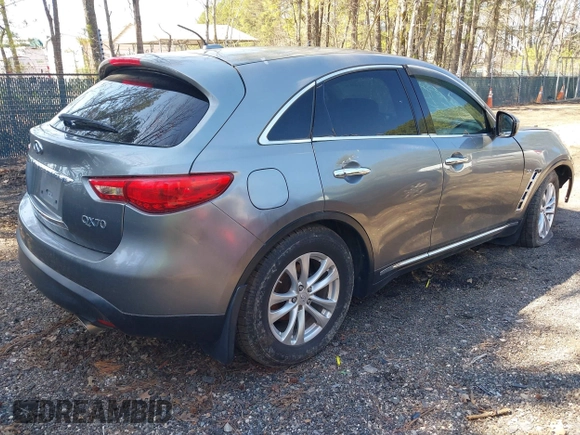 2014 Infiniti QX70 с VIN JN8CS1MW9EM413406, выставлен на аукционе IAAI как лот 41909387 с пробегом 123 957 миль миль и . История ставок и продаж доступна на DreamBid. Изображение 4.