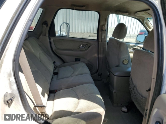 2002 Mazda Tribute LX with VIN 4F2YU09132KM10219, listed as a Copart auction lot 70619724 with 202,687 mi miles and Salvage Title. Bid and sale history available at carsss.com. Image 11.
