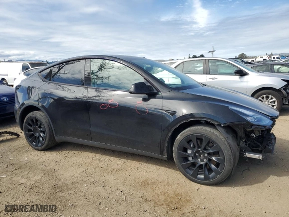 2022 Tesla Model Y Long Range with VIN 7SAYGDEE2NF575433, listed as a Copart auction lot 47576175 with 53,642 mi miles and Salvage Title. Bid and sale history available at carsss.com. Image 4.