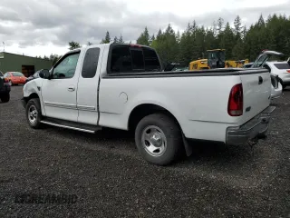 2003 Ford F-150 XL with VIN 1FTRX17L93NB69644, listed as a Copart auction lot 57130275 with 191,302 mi miles and Salvage title. Bid and sale history available at DreamBid. Image 2.