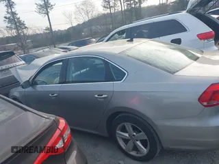 2012 Volkswagen Passat SE z VIN 1VWBH7A3XCC108676, wystawiony jako IAAI lot #41897380 z przebiegiem 94 066 mil mil oraz . Historia ofert i sprzedaży dostępna na DreamBid. Obrazek 14.