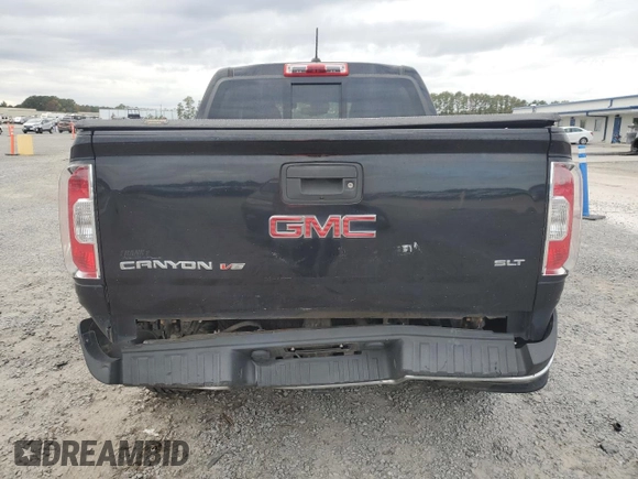 2018 GMC Canyon 4WD SLT with VIN 1GTG6DEN7J1173793, listed as a Copart auction lot 77066714 with 94,137 mi miles and Salvage Title. Bid and sale history available at carsss.com. Image 6.