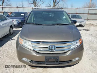 2012 Honda Odyssey Touring with VIN 5FNRL5H9XCB110672, listed as a IAAI auction lot 41826895 with 159,927 mi miles. Bid and sale history available at carsss.com. Image 12.
