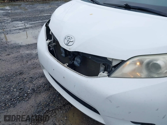 2013 Toyota Sienna LE with VIN 5TDJK3DC9DS055134, listed as a IAAI auction lot 42255532 with 156,381 mi miles and . Bid and sale history available at DreamBid. Image 6.
