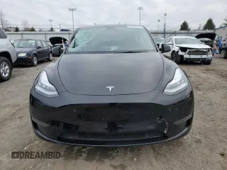 2023 Tesla Model Y Long Range with VIN 7SAYGDEE1PA150771, listed as a Copart auction lot 81805194 with 23,718 mi miles and Salvage Title. Bid and sale history available at DreamBid. Image 5.