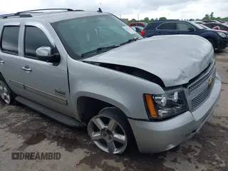 2011 Chevrolet Tahoe LT with VIN 1GNSCBE01BR394862, listed as a IAAI auction lot 42077481 with 86,772 mi miles and . Bid and sale history available at DreamBid. Image 1.