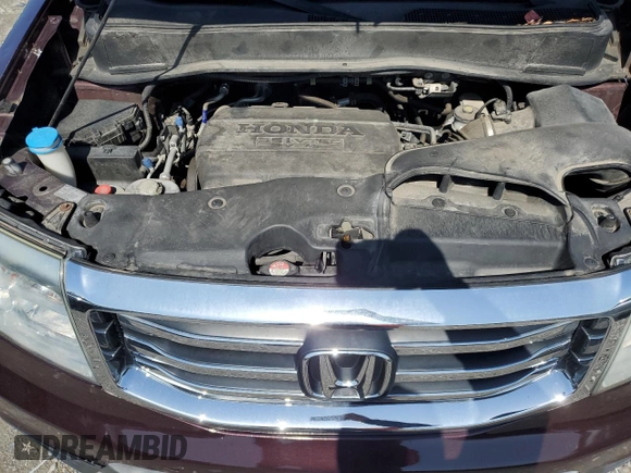 2012 Honda Pilot EX-L with VIN 5FNYF4H51CB080729, listed as a Copart auction lot 51918975 with 71,927 mi miles and Salvage Title. Bid and sale history available at carsss.com. Image 12.