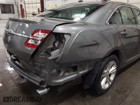 2013 Ford Taurus SEL with VIN 1FAHP2E86DG177504, listed as a IAAI auction lot 42071852 with 130,547 mi miles and . Bid and sale history available at carsss.com. Image 14.