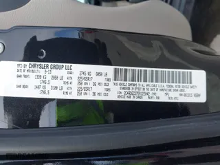 2014 Dodge Grand Caravan SXT 30th Anniversary with VIN 2C4RDGCG7ER122042, listed as a IAAI auction lot 41600892 with 101,596 mi miles. Bid and sale history available at carsss.com. Image 8.