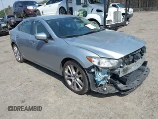 2017 Mazda Mazda6 Touring with VIN JM1GL1V52H1126639, listed as a IAAI auction lot 41802868 with 181,948 mi miles. Bid and sale history available at carsss.com. Image 1.