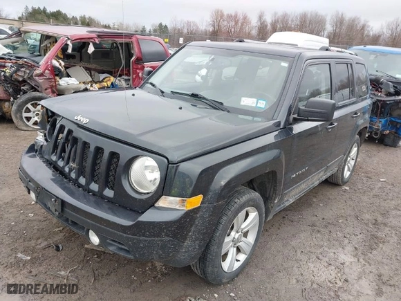 2014 Jeep Patriot Limited with VIN 1C4NJRCB8ED648089, listed as a IAAI auction lot 41801878 with 102,346 mi miles. Bid and sale history available at carsss.com. Image 2.