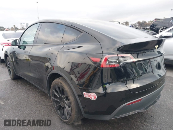 2023 Tesla Model Y Long Range with VIN 7SAYGDEE2PA024032, listed as a IAAI auction lot 41213403 with 23,418 mi miles and . Bid and sale history available at DreamBid. Image 14.