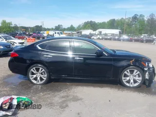 2013 Infiniti M with VIN JN1AY1AR6DM590187, listed as a IAAI auction lot 42096806 with 182,909 mi miles and . Bid and sale history available at DreamBid. Image 13.