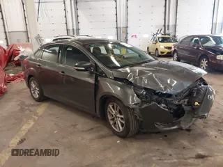 2015 Ford Focus SE with VIN 1FADP3F2XFL201554, listed as a IAAI auction lot 41817418 with 101,938 mi miles. Bid and sale history available at carsss.com. Image 1.
