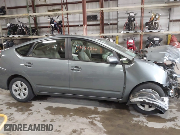 2005 Toyota Prius with VIN JTDKB20U453123405, listed as a IAAI auction lot 42080386 with 262,688 mi miles and . Bid and sale history available at DreamBid. Image 14.