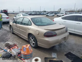 2003 Pontiac Grand Prix GT with VIN 1G2WP52K23F162669, listed as a IAAI auction lot 41467652 with 184,922 mi miles. Bid and sale history available at carsss.com. Image 3.