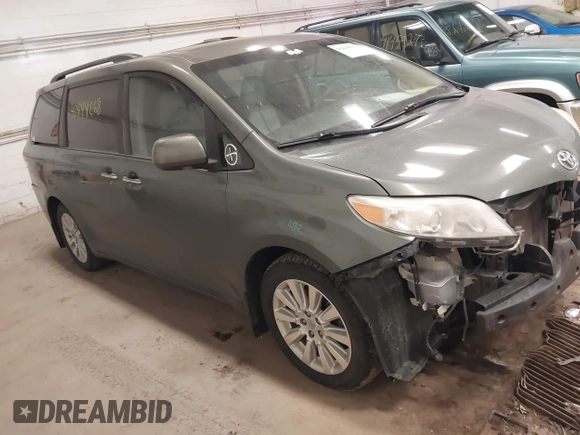 2011 Toyota Sienna XLE with VIN 5TDDK3DC0BS008343, listed as a IAAI auction lot 41444268 with 215,778 mi miles. Bid and sale history available at carsss.com. Image 1.