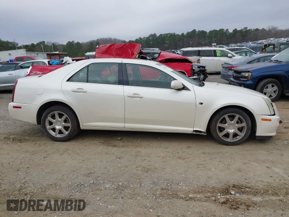 2005 Cadillac STS z VIN 1G6DW677250198015, wystawiony jako IAAI lot #41543304 z przebiegiem 160 000 mil mil oraz . Historia ofert i sprzedaży dostępna na DreamBid. Obrazek 13.