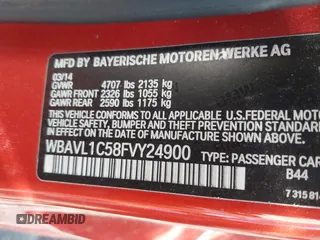 2015 BMW X1 xDrive28i with VIN WBAVL1C58FVY24900, listed as a IAAI auction lot 41772097 with 128,001 mi miles. Bid and sale history available at carsss.com. Image 9.