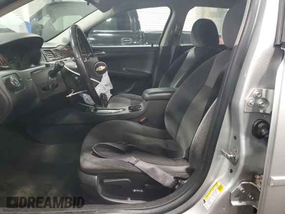 2014 Chevrolet Impala LS with VIN 2G1WA5E34E1173578, listed as a Copart auction lot 43171965 with 139,310 mi miles and Salvage Title. Bid and sale history available at DreamBid. Image 7.