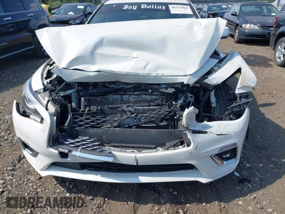 2019 Infiniti Q50 Luxe with VIN JN1EV7ARXKM557946, listed as a IAAI auction lot 40362058 with 56,615 mi miles and . Bid and sale history available at carsss.com. Image 12.