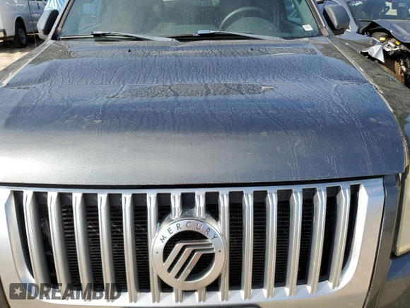 2009 Mercury Mariner with VIN 4M2CU81G69KJ18657, listed as a Copart auction lot 68869154 with 186,290 mi miles and Salvage title. Bid and sale history available at DreamBid. Image 14.