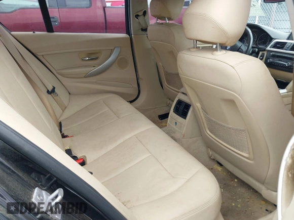 2015 BMW 3 Series 320i with VIN WBA3B1G57FNT05826, listed as a IAAI auction lot 42103193 with 128,800 mi miles. Bid and sale history available at carsss.com. Image 8.