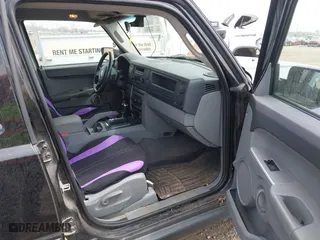 2007 Jeep Commander Sport with VIN 1J8HG48K17C651084, listed as a IAAI auction lot 42064395 with 212,057 mi miles. Bid and sale history available at carsss.com. Image 5.
