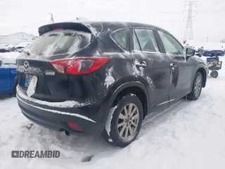 2016 Mazda CX-5 Sport z VIN JM3KE4BY0G0919017, wystawiony jako IAAI lot #41316161 z przebiegiem 209 259 mil mil oraz . Historia ofert i sprzedaży dostępna na DreamBid. Obrazek 4.