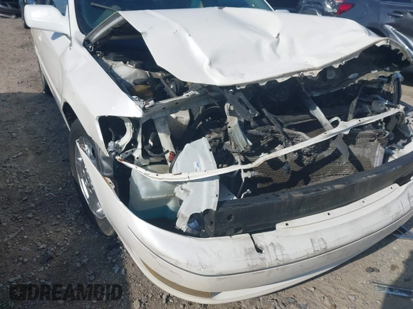 2004 Toyota Avalon XL z VIN 4T1BF28BX4U343188, wystawiony jako IAAI lot #42163107 z przebiegiem Nie podano mil oraz . Historia ofert i sprzedaży dostępna na DreamBid. Obrazek 19.