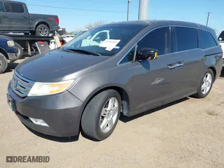 2013 Honda Odyssey Touring with VIN 5FNRL5H98DB085627, listed as a IAAI auction lot 41742702 with 117,899 mi miles. Bid and sale history available at carsss.com. Image 17.