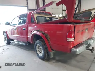 2000 Dodge Dakota Sport z VIN 1B7GG2AN5YS793828, wystawiony jako IAAI lot #41955863 z przebiegiem 267 861 mil mil oraz . Historia ofert i sprzedaży dostępna na DreamBid. Obrazek 3.