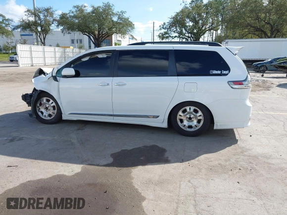 2015 Toyota Sienna SE with VIN 5TDXK3DC4FS678965, listed as a IAAI auction lot 40817635 with 147,027 mi miles. Bid and sale history available at carsss.com. Image 14.
