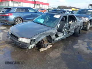 1997 Honda Accord EX with VIN 1HGCD565XVA049579, listed as a IAAI auction lot 40867933 with 189,191 mi miles and . Bid and sale history available at DreamBid. Image 21.