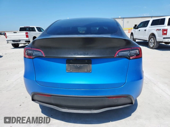 2024 Tesla Model Y Long Range z VIN 7SAYGDEE3RA238059, wystawiony jako Copart lot #61395925 z przebiegiem 14 991 mil mil oraz Szkoda całkowita • Salvage title. Historia ofert i sprzedaży dostępna na DreamBid. Obrazek 6.