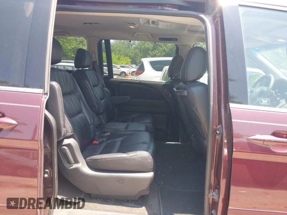 2010 Honda Odyssey Touring z VIN 5FNRL3H92AB010292, wystawiony jako IAAI lot #42469216 z przebiegiem 188 921 mil mil oraz . Historia ofert i sprzedaży dostępna na DreamBid. Obrazek 8.