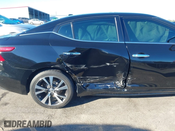2016 Nissan Maxima SV with VIN 1N4AA6AP0GC385090, listed as a IAAI auction lot 41215857 with 97,072 mi miles and . Bid and sale history available at DreamBid. Image 6.