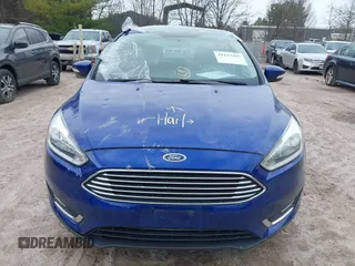 2015 Ford Focus Titanium with VIN 1FADP3J27FL298882, listed as a IAAI auction lot 42117247 with 124,185 mi miles and . Bid and sale history available at carsss.com. Image 12.