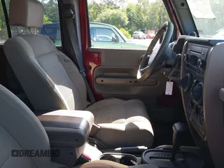 2007 Jeep Wrangler Unlimited Sahara с VIN 1J8GA59187L211825, выставлен на аукционе IAAI как лот 42313099 с пробегом 107 554 миль миль и . История ставок и продаж доступна на DreamBid. Изображение 5.