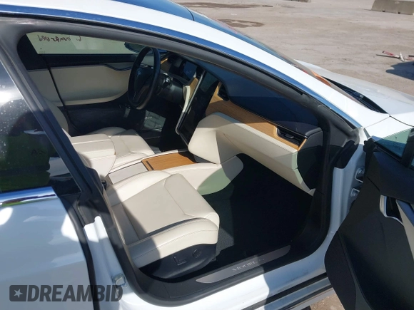 2020 Tesla Model S Long Range with VIN 5YJSA1E23LF360441, listed as a IAAI auction lot 41312865 with 68,967 mi miles and . Bid and sale history available at DreamBid. Image 5.